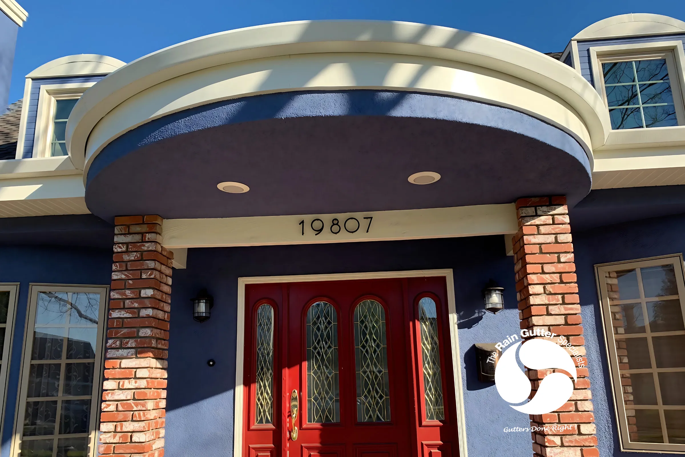 Colonial-style house with copper gutters
