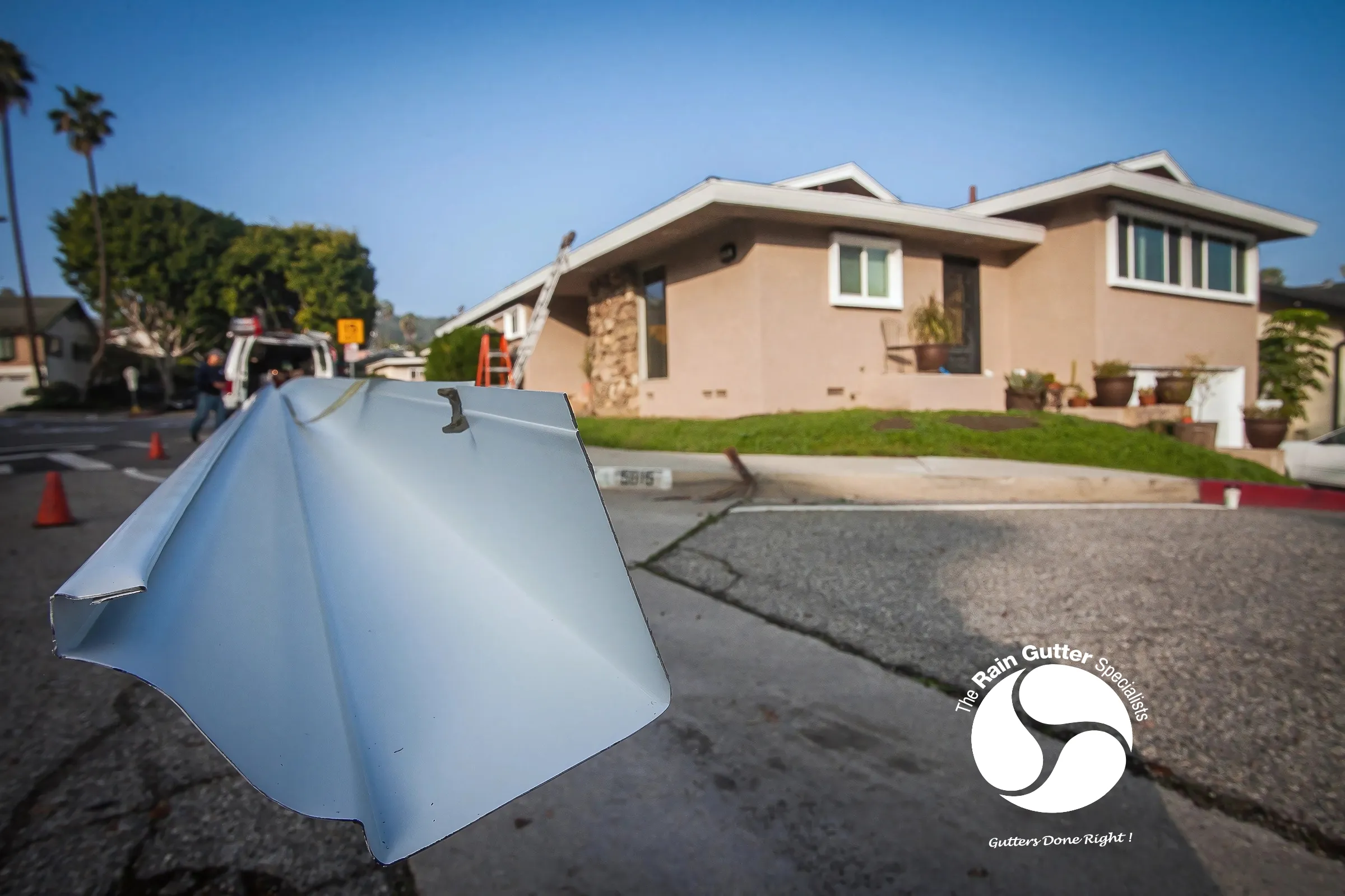 Modern home with geometric roof and gutter design