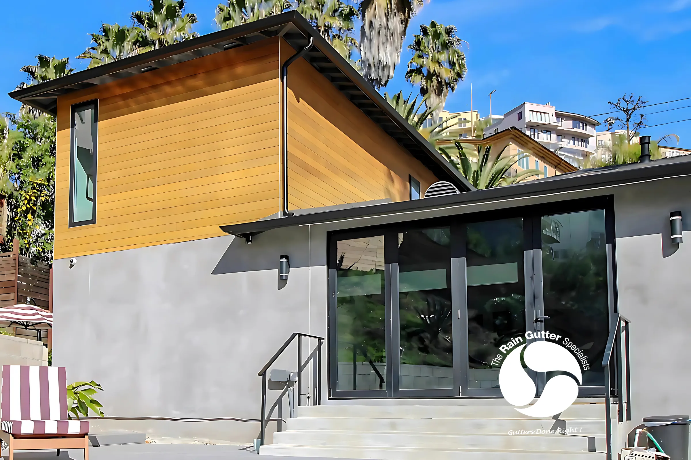 Contemporary home with dark seamless gutters